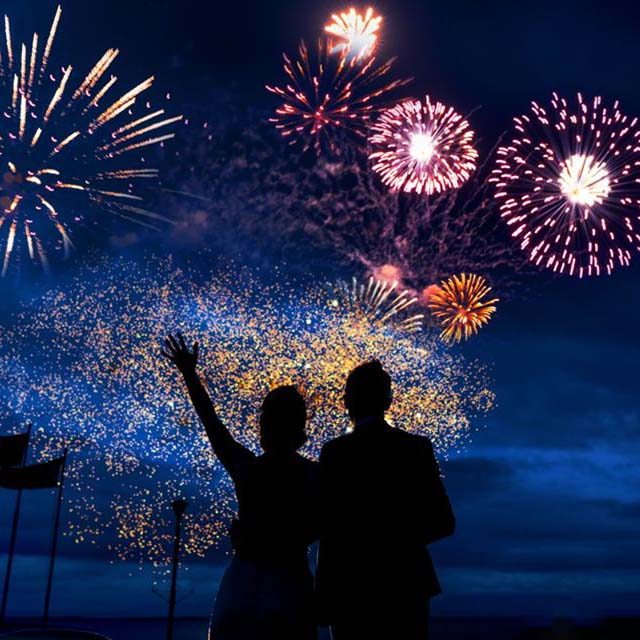 Bride & groom watching fireworks