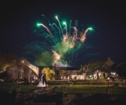 Married couple watching fireworks display in the UK