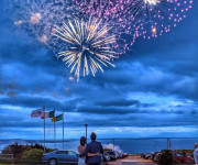 Bride and groom watching fireworks display in the UK