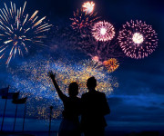 Couple watching a colourful fireworks display in the UK