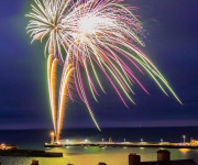 Colourful fireworks display over the water in the UK