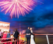 Bride and groom watching fireworks in the UK